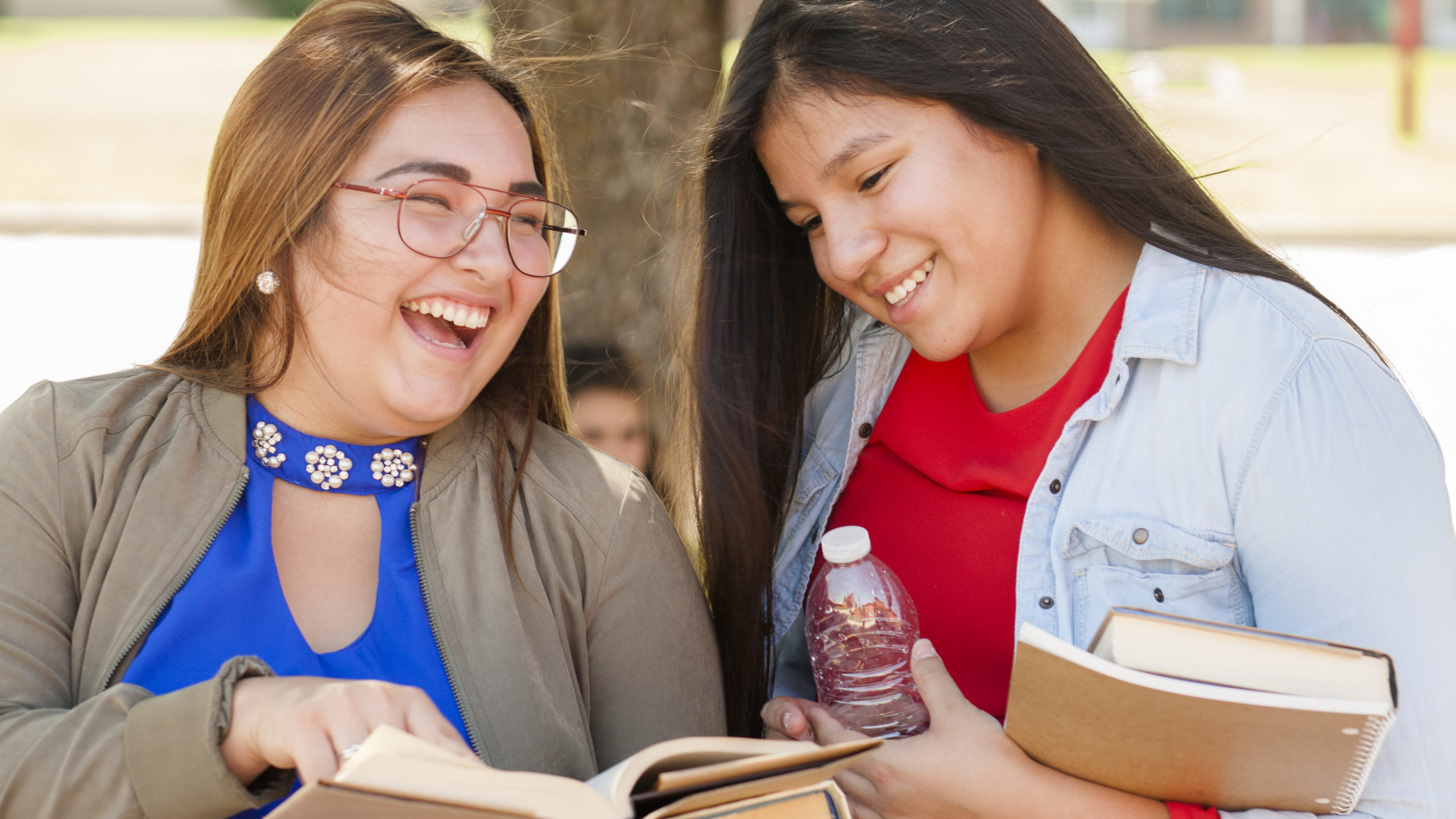 Latin American Teens Hang and Talk Over Books